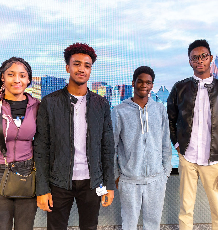 Black CS Success Summit students in front of a Chicago skyline backdrop